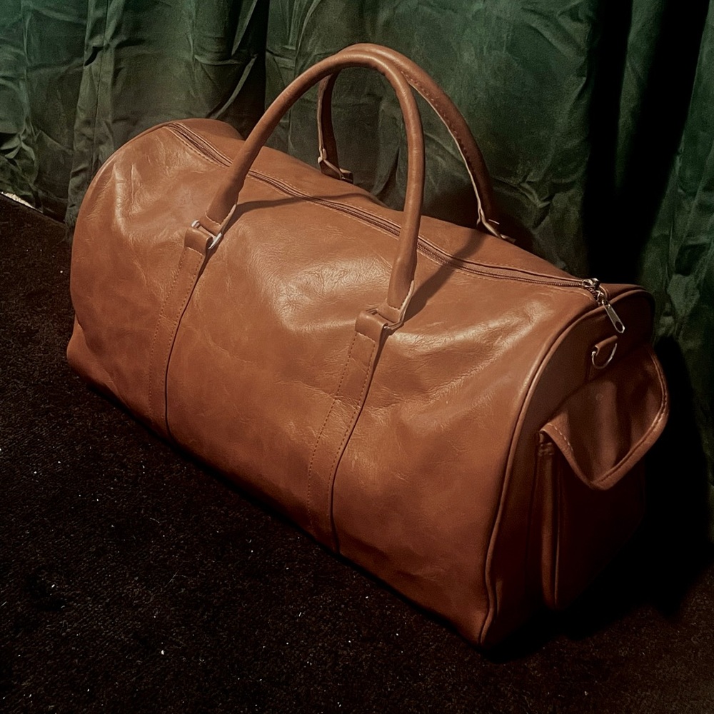 From either the late 60s or early 70s leather duffel/Doctor style bag